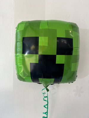 Minecraft Creeper foil balloon by Anagram, featuring a green Creeper face design, ideal for gaming-themed celebrations.